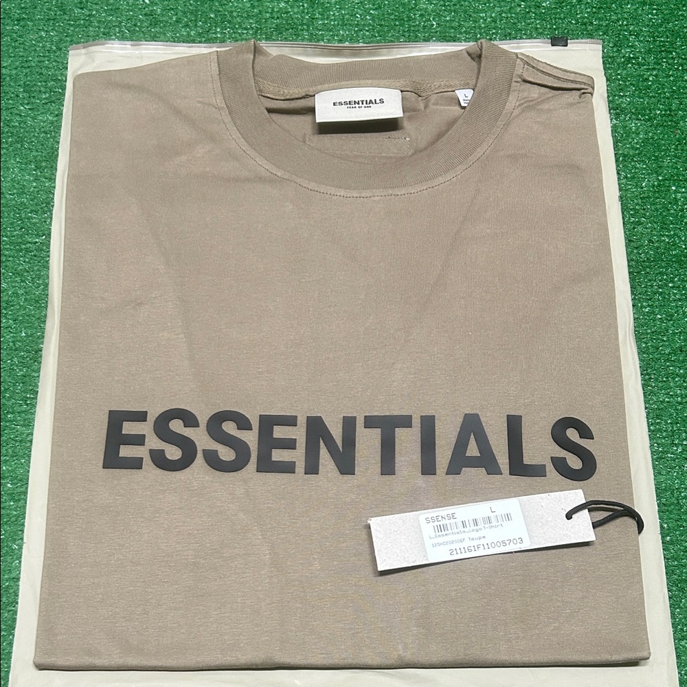Essentials taupe tee size L